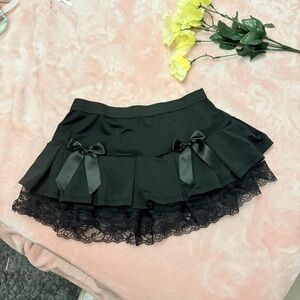 Spencer's Black Skirt with Lace and Bows